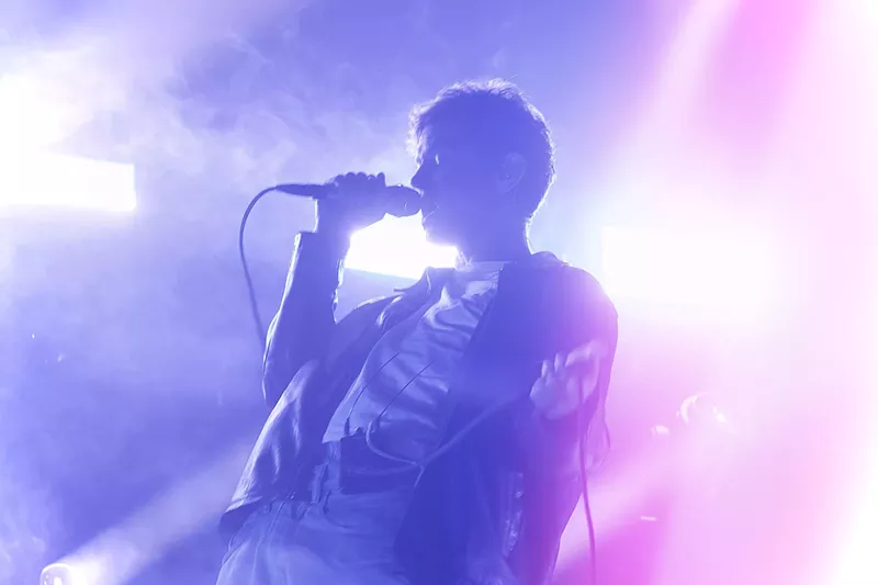 Image: Man singing on stage