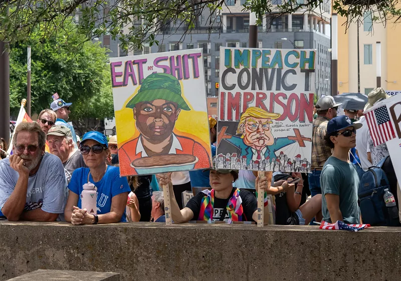 Image: Many signs at the No Kings protest in Dallas didn't require further explanation.