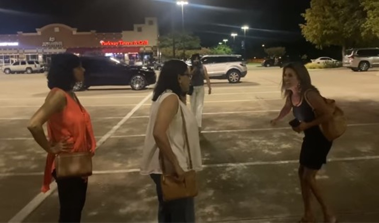 Esmeralda Upton of Plano, right, berated four women outside of the Sixty Vines restaurant on Dallas Parkway in West Plano on Wednesday.