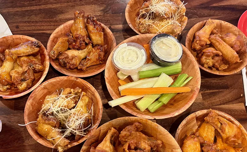 Image: Poutine and Cajun Wings at Duff's Famous Wings from New York