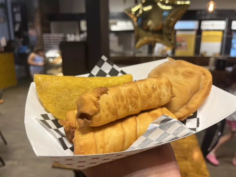 Image: Tequenos, empanadas and pasteles are just some of the fried snacks you can order at the counter.