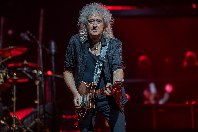 Queen and Adam Lambert honored the Texas Rangers at their Dallas show.