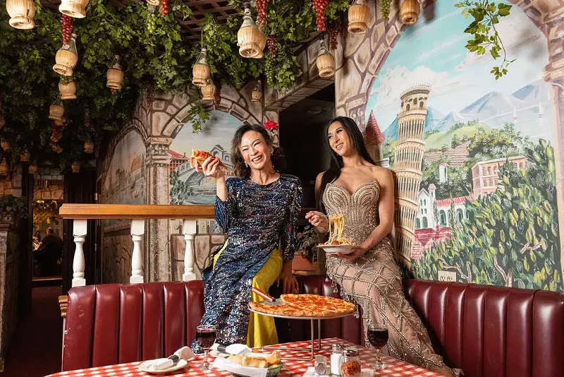 Image: Catherine Vo and Mulan Nguyen enjoy pizza, pasta and drinks at Two Guys from Italy, an Italian eatery.