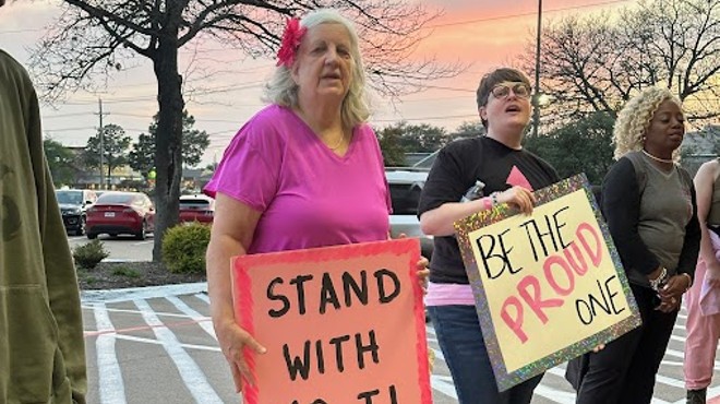 Protesters in support of Rachmad Tjachyadi in Lewisville.