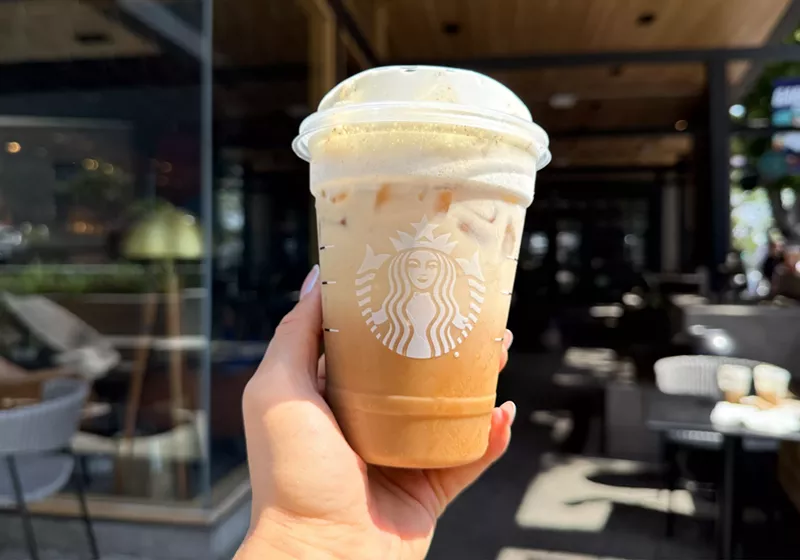 Image: A brown sugar oatmilk shaken espresso with white chocolate mocha sauce and vanilla sweet cream cold foam