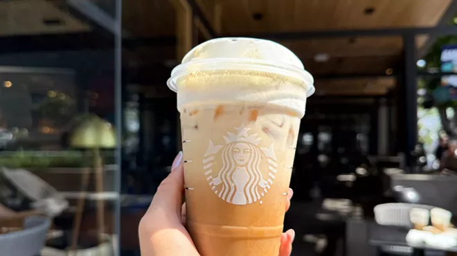 A brown sugar oatmilk shaken espresso with white chocolate mocha sauce and vanilla sweet cream cold foam