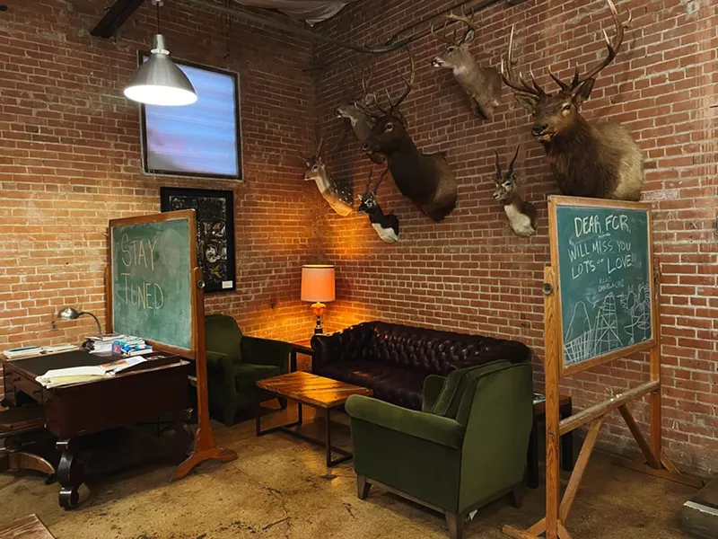 Image: Taxidermy deer and art. A natural fit at Full City Rooster.