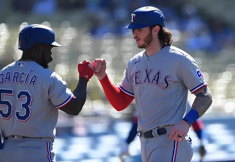 Image: Texas Ranger Jonah Heim with Adolis Garcia, No. 53