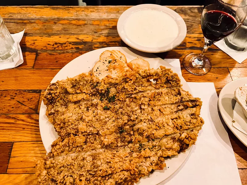 Image: Don't you hate it when your chicken fried steak is so big that it overflows both your plate and your photo?