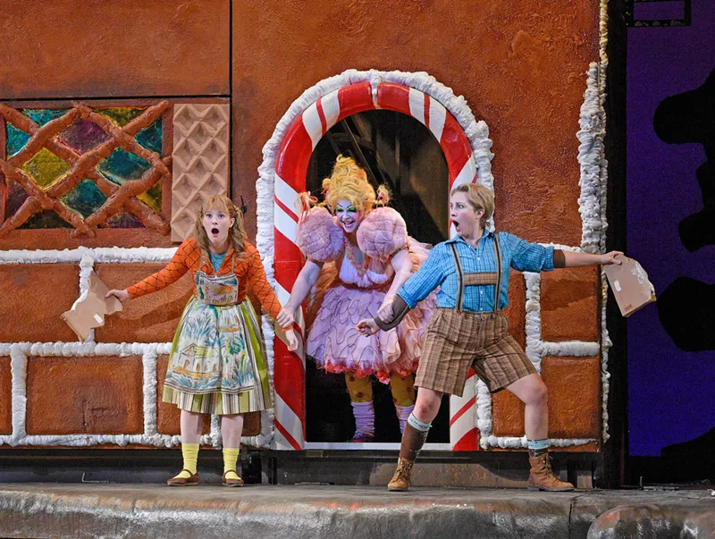 Image: The evil witch captures Hansel and Gretel for her latest snack in the Dallas Opera's performance of Hansel and Gretel at the Winspear Opera House.