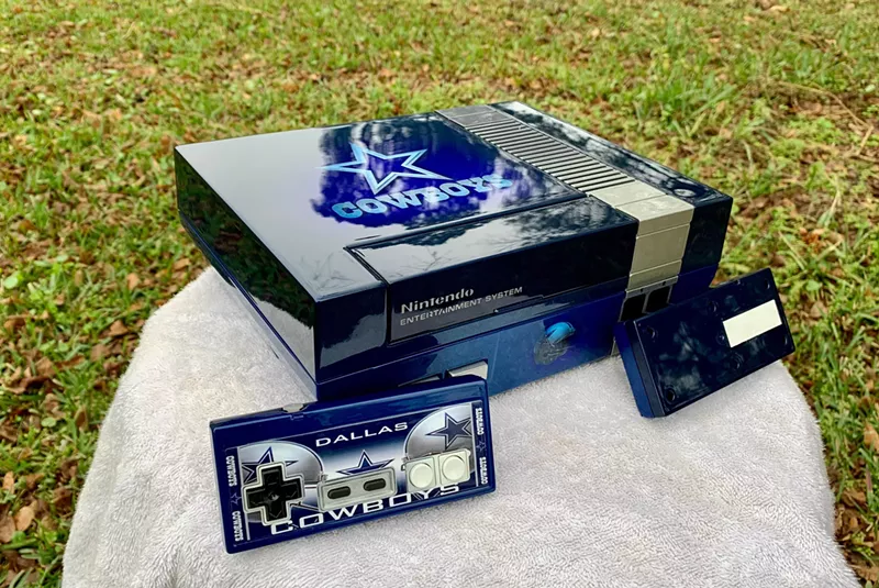 Image: Console modder Jared Smith of Valdosta, Georgia, painted a custom Nintendo Entertainment System (NES) for a local Dallas Cowboys fan.