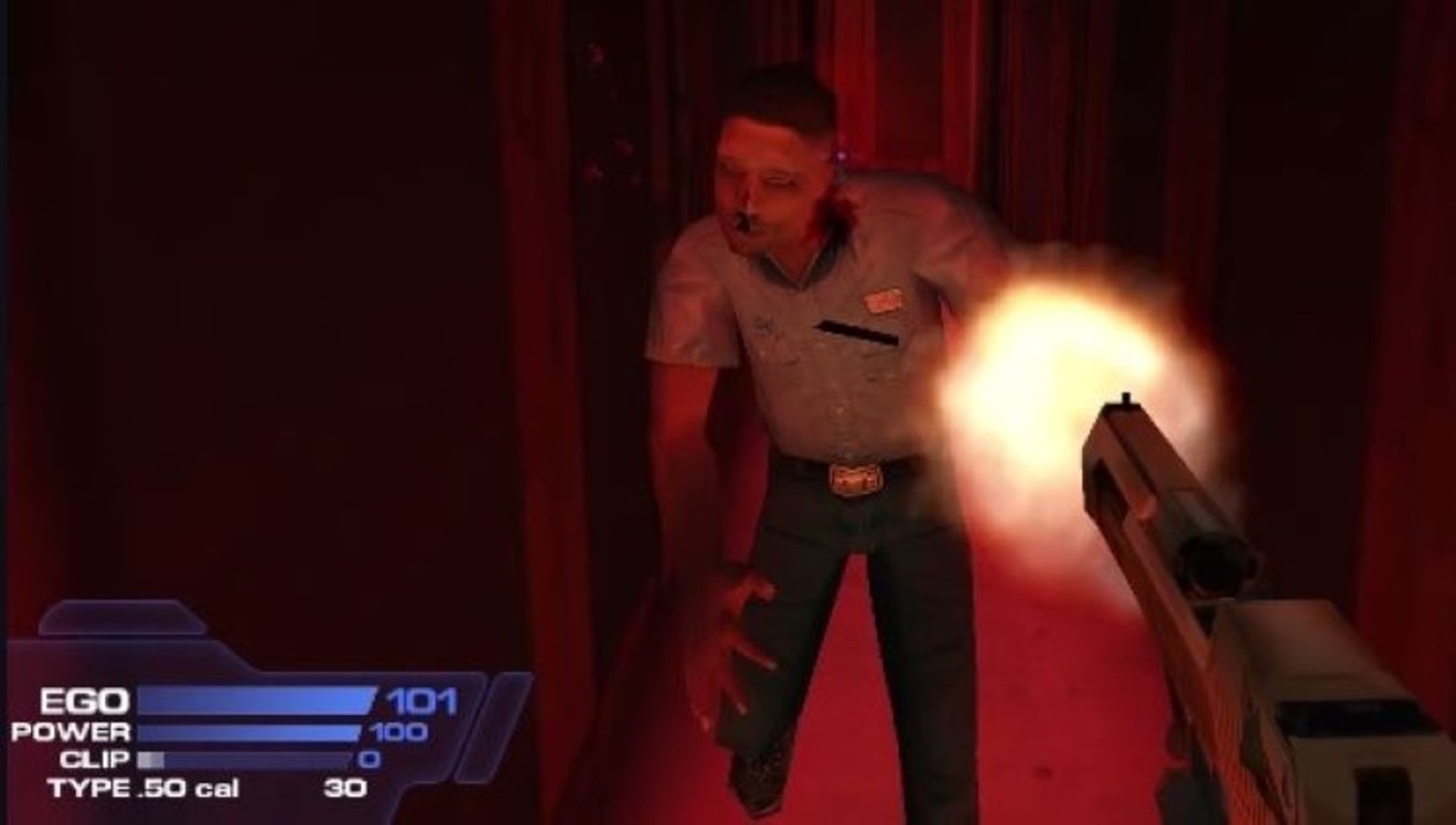 Duke Nukem guns down an infected soldier with his gold Desert Eagle in a leaked, earlier version of the first person shooter game Duke Nukem Forever made by 3D Realms.