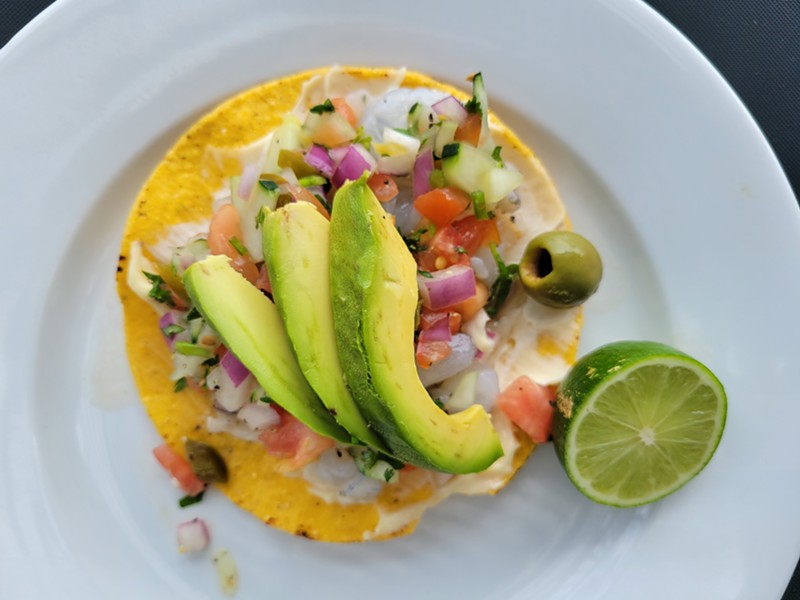 Suddenly we can't stop thinking about all the dishes that use avocado, like this ceviche tostada.