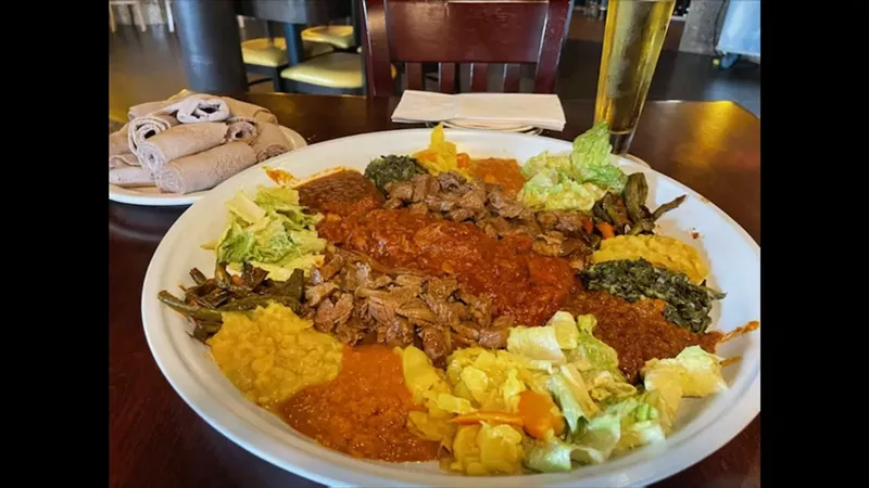 Image: Vegetable combo for two with siga tibs and fish goulash