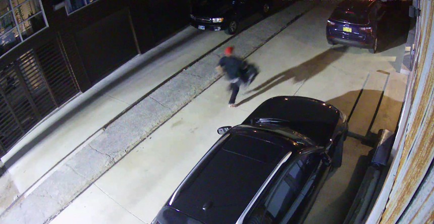 A security camera from a nearby business caught footage of an unidentified man who robbed the tour van of the indie rock group Brother Moses just before their set at the Deep Allum Arts Co. on Commerce Street on Tuesday night. - COURTESY OF JAMES LOCKHART