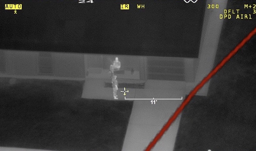 DPD watching a Dallas resident on their front porch, using thermal imaging and high definition cameras. - DDOSECRETS