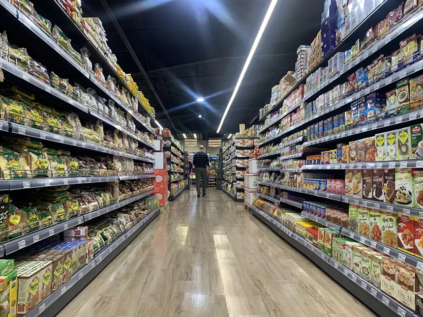 Jasmine Cafe's new location includes a supermarket stocked with foods from the Middle East. - PATRICK STRICKLAND