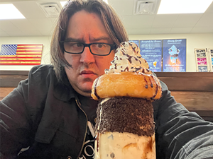 Dallas Observer writer Danny Gallagher realizes he has to eat The Yard Milkshake Bar's Doughnut Touch My Coffees and Cream milkshake without suffering shock so he can write his review. - DANNY GALLAGHER