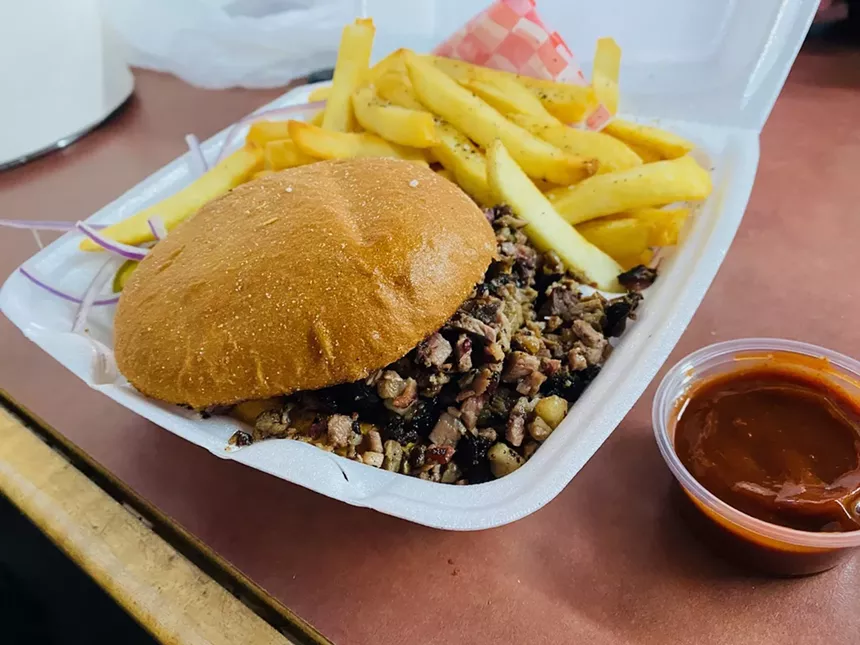 The chopped brisket sandwich is chopped as ordered and served with a side of barbecue sauce. - LAUREN DREWES DANIELS