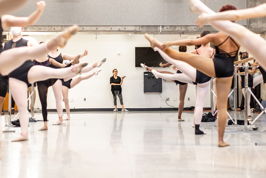 Dance instructor Estela Tejeda-Moreno gives her class dance position cues. - KATHY TRAN