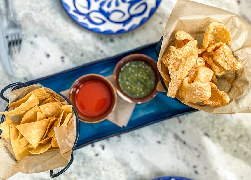 Chicharróns are served along with chips and salsa. - HANK VAUGHN