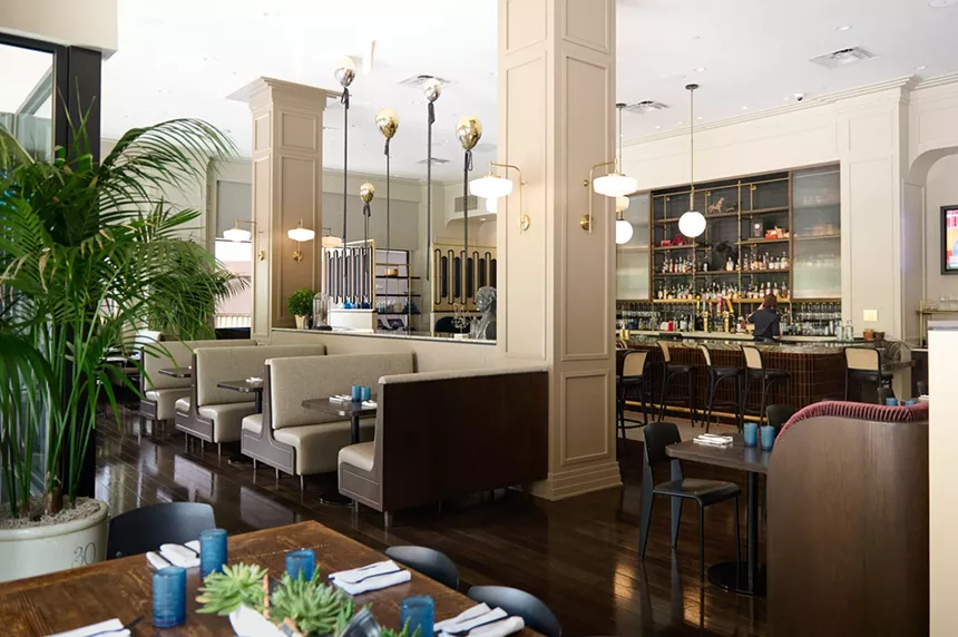 Toussaint is both swank and comfortable. Large windows, light and soft hues surround brass, marble and dark wood with impeccable accouterments. - ALISON MCLEAN