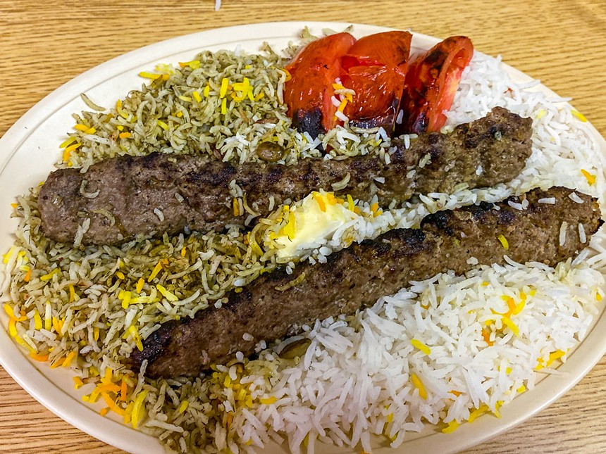 Chelo kabob: ground beef served with rice, roasted tomatoes, onions, limes and jalapeños - HANK VAUGHN