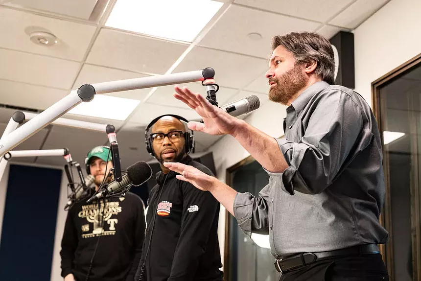 Gordon Keith (right) talks to Donovan Lewis (center) and Matt McClearin during "cross talk" between showson 1310 The Ticket, an all-sports station that has never been only about sports.