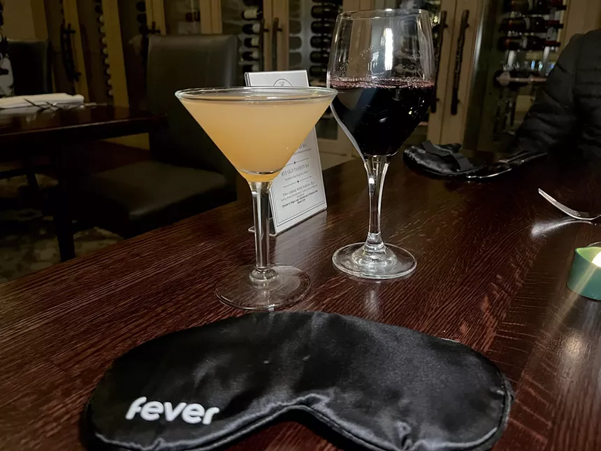 A cocktail and wine at dining in the dark.