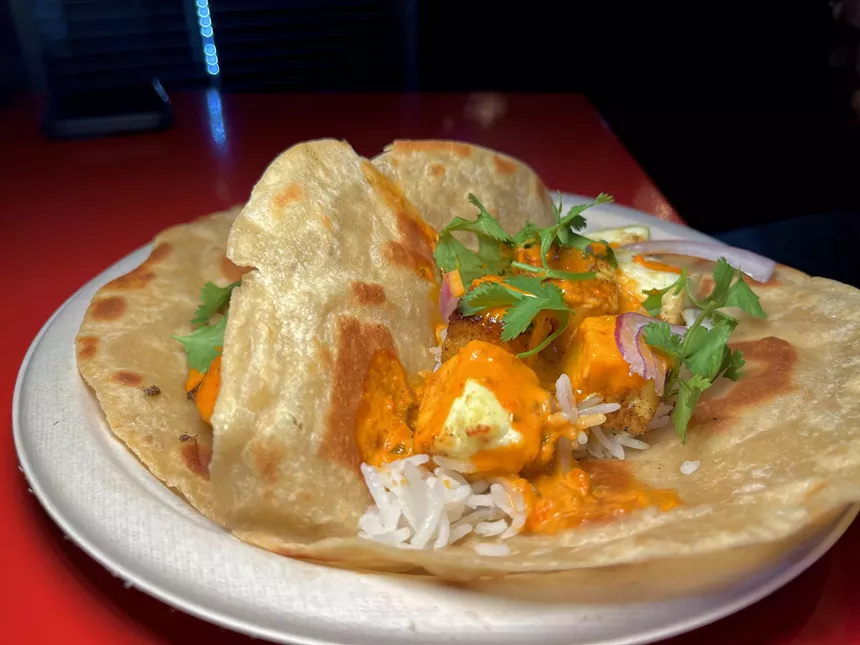 One of 8 Cloves Paneer tacos on a puffed roti pastry.