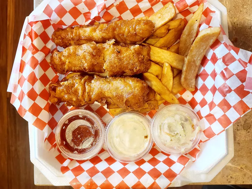 fish and chips with a thick dos equis batter