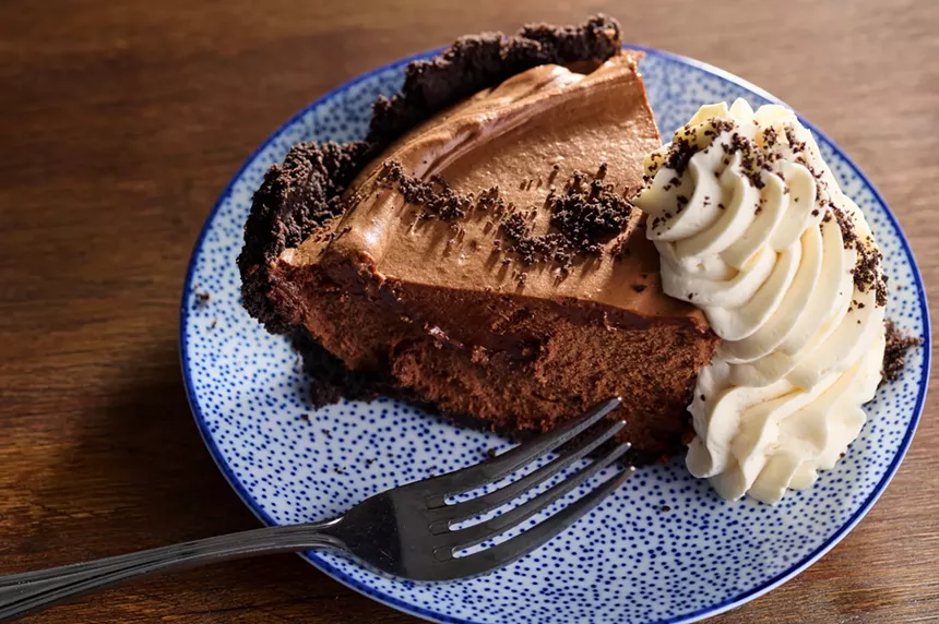 The chocolate silk pie with a dollop of whipped cream at Heritage Table.