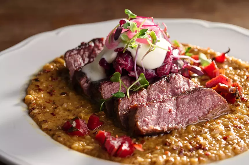 Wagyu beef shoulder on a bed of sweet potato risotto.