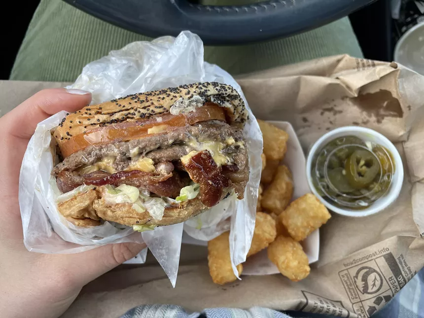 a cheeseburger, tater tots at Keller's in Dallas.