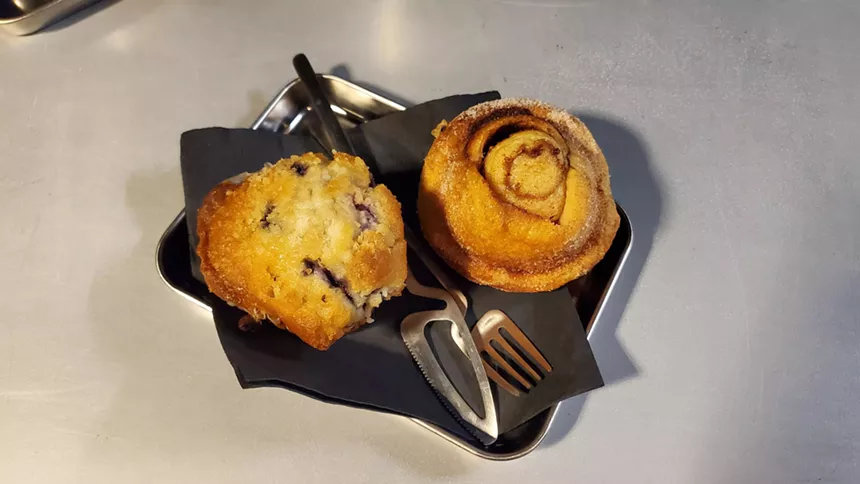 A blueberry muffin and cinnamon bun at Khroma cafe.