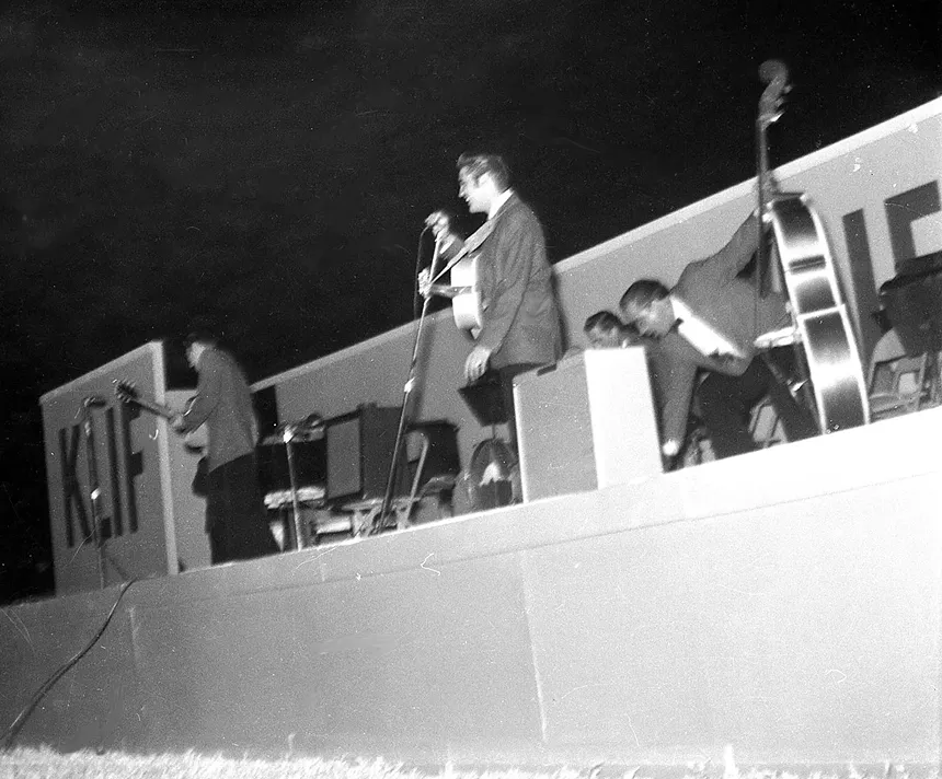 Elvis and his band play the Cotton Bowl for the State Fair of Texas in 1965.