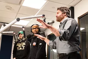 Gordon Keith (right) talks to Donovan Lewis (center) and Matt McClearin during "cross talk" between showson 1310 The Ticket, an all-sports station that has never been only about sports.