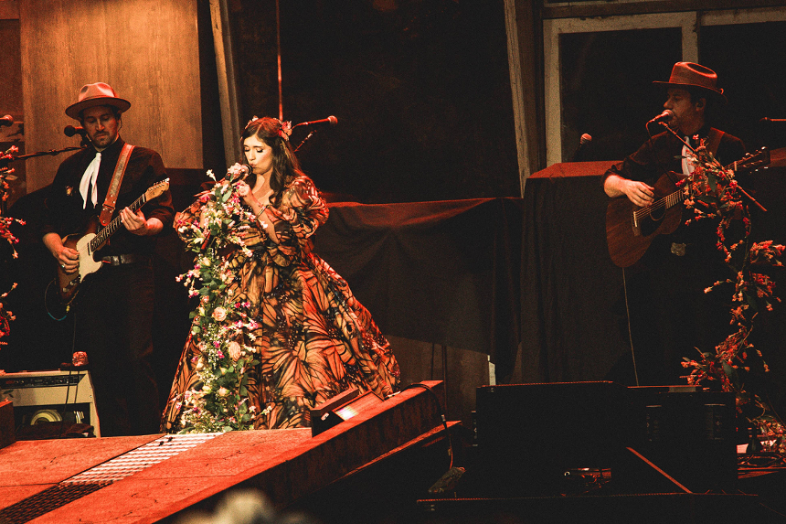 Woman singing on stage