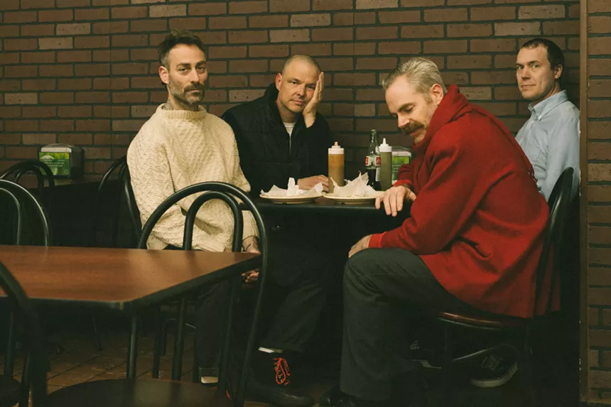 Men sitting at a table