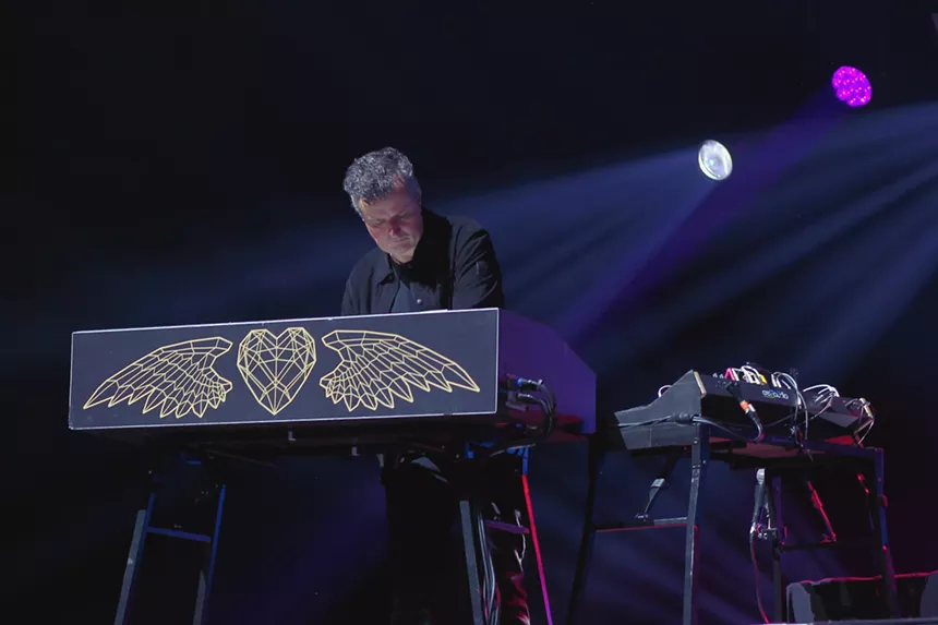 Man keyboarding on stage