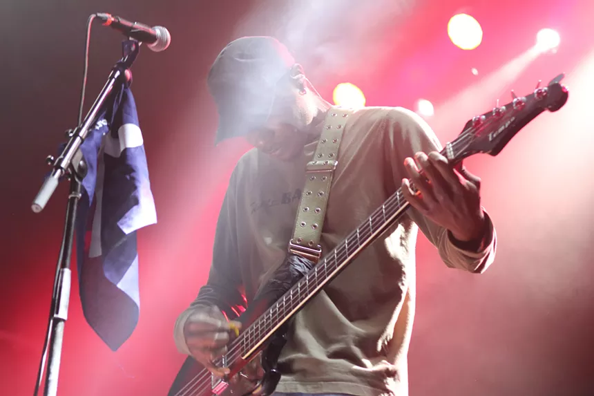 Man playing bass on stage