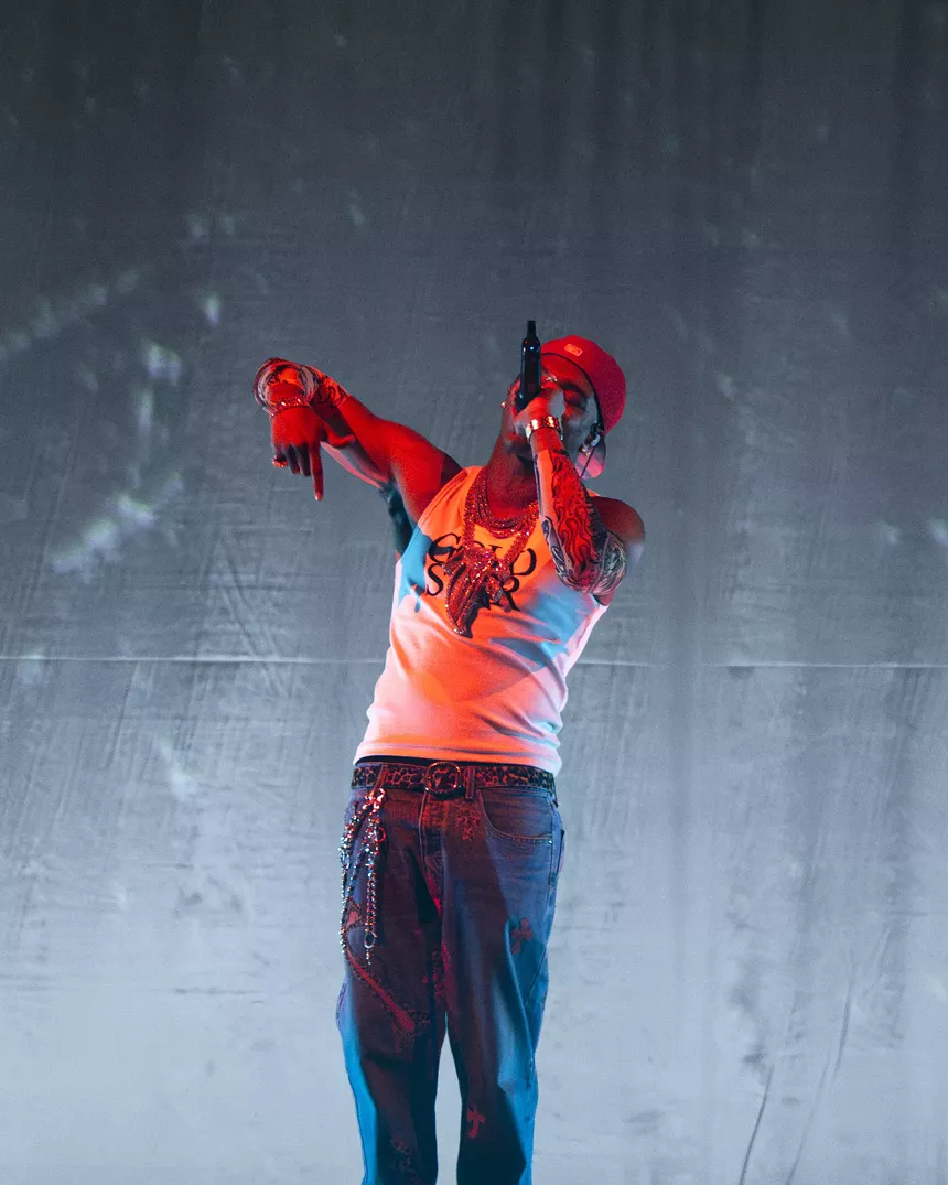Man on stage performing