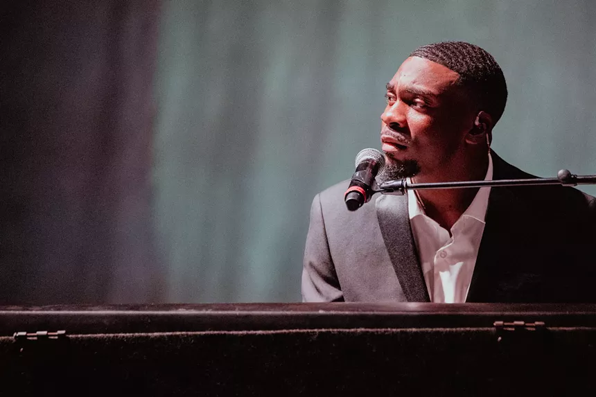 Man performing on a piano