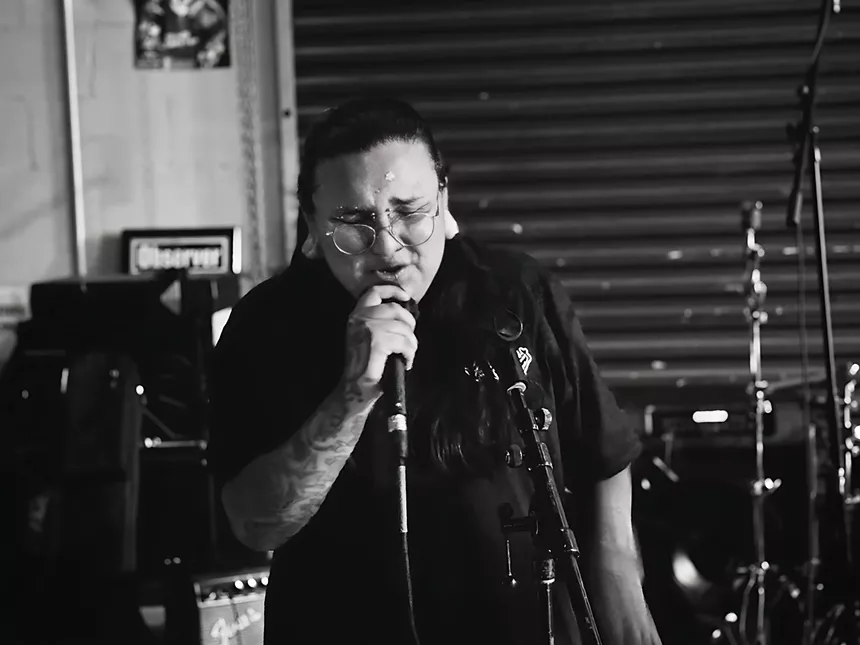 Man singing on stage