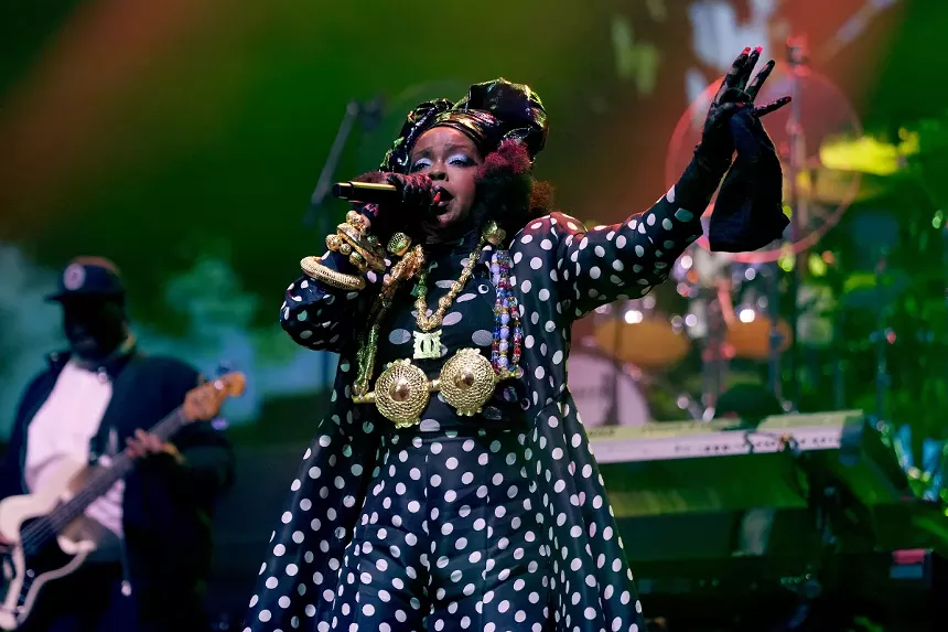 Woman singing on stage