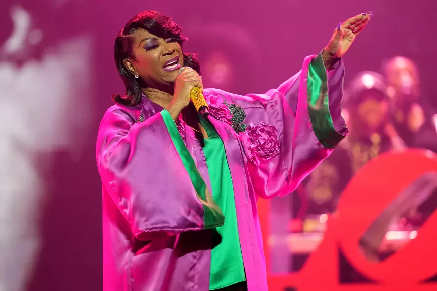 Woman singing on stage