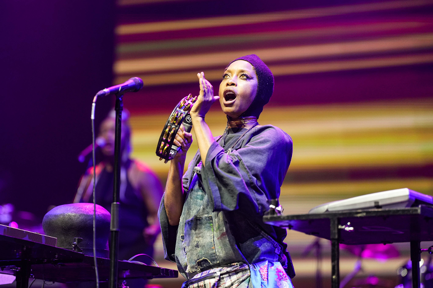 Woman singing on stage