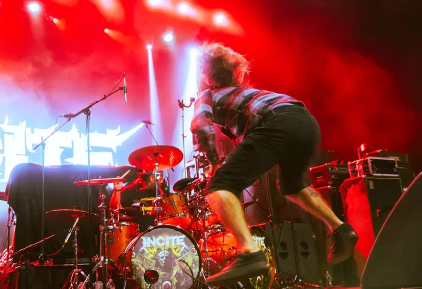Metal band playing on stage