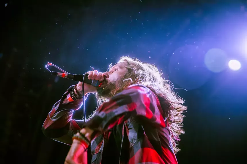 Metal band playing on stage