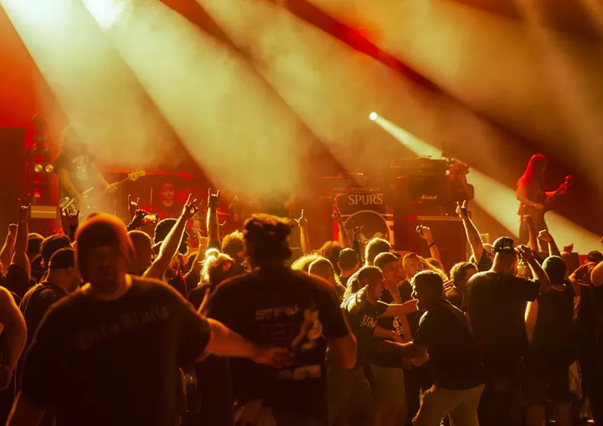 Metal band playing on stage